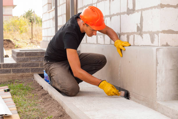 Waterproofing professionals working in Akron, OH